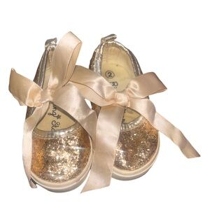 Rising Star Gold glittery infant shoes with bow size 2